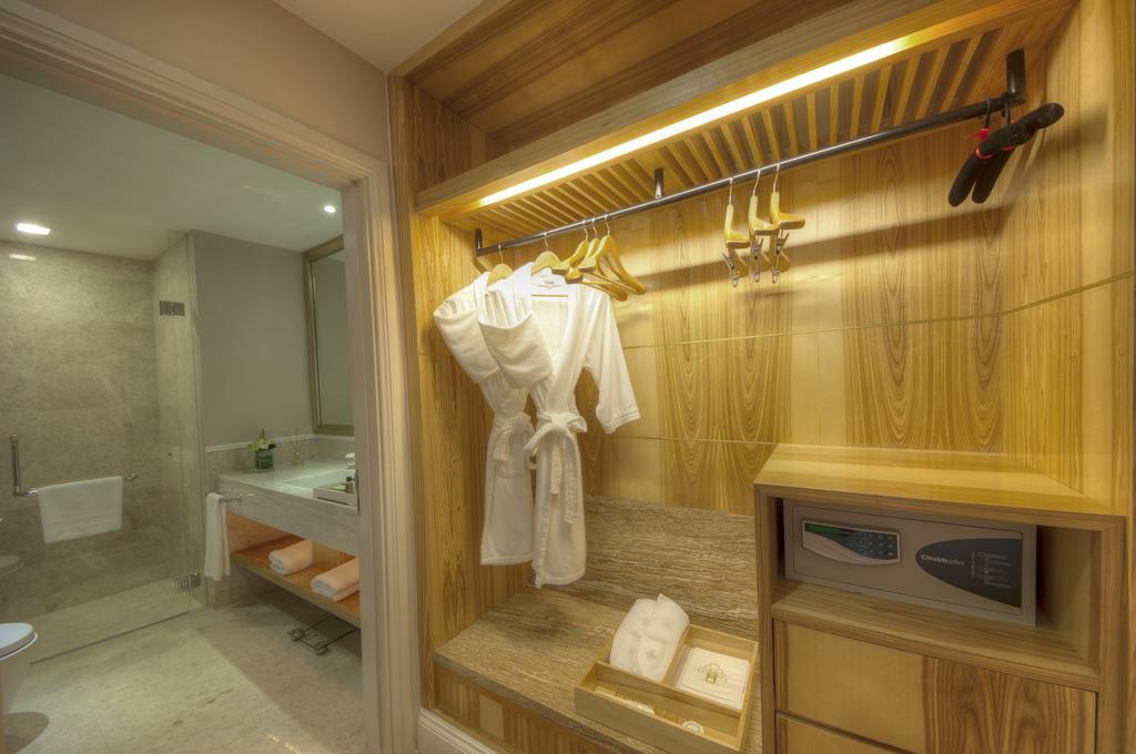 The Chateau Spa & Wellness Resort Bukit Tinggi Exterior photo A bathrobe hanging on a rack